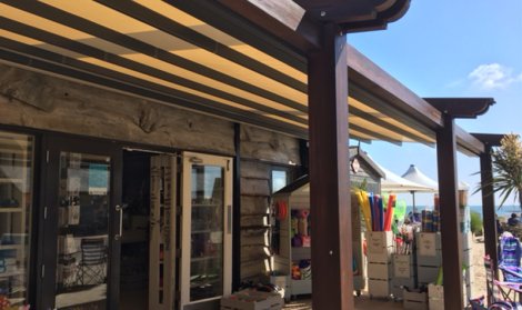 wooden canopy covering front of shop