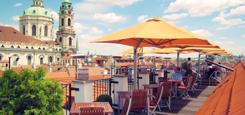 An outdoor restaurant terrace with parasols 