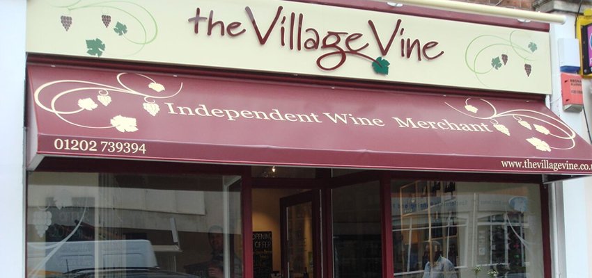 a wine merchant with a custom shop awning
